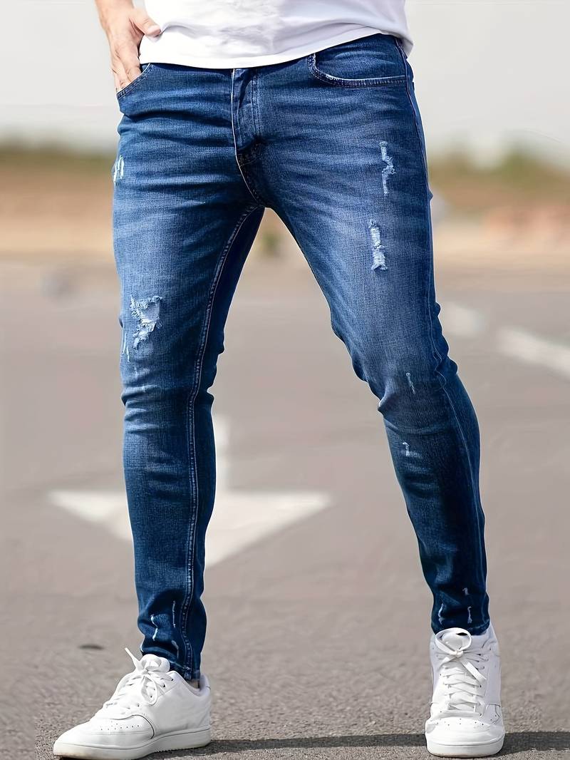 Jeans slim-fit stretch homme, denim bleu moderne, confort casual chic.