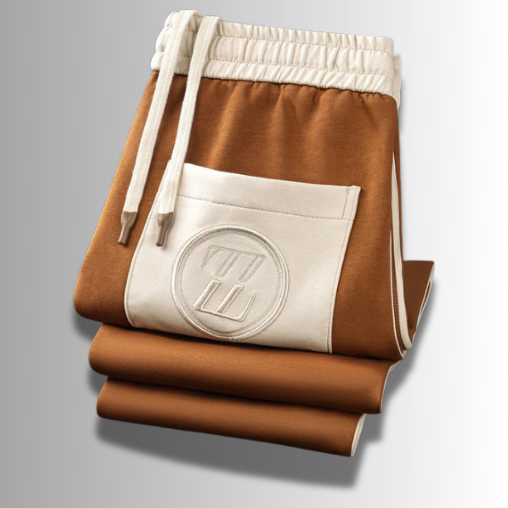 Jogging homme élégant et décontracté pour automne, alliant confort et style pour une vie active ou relax.