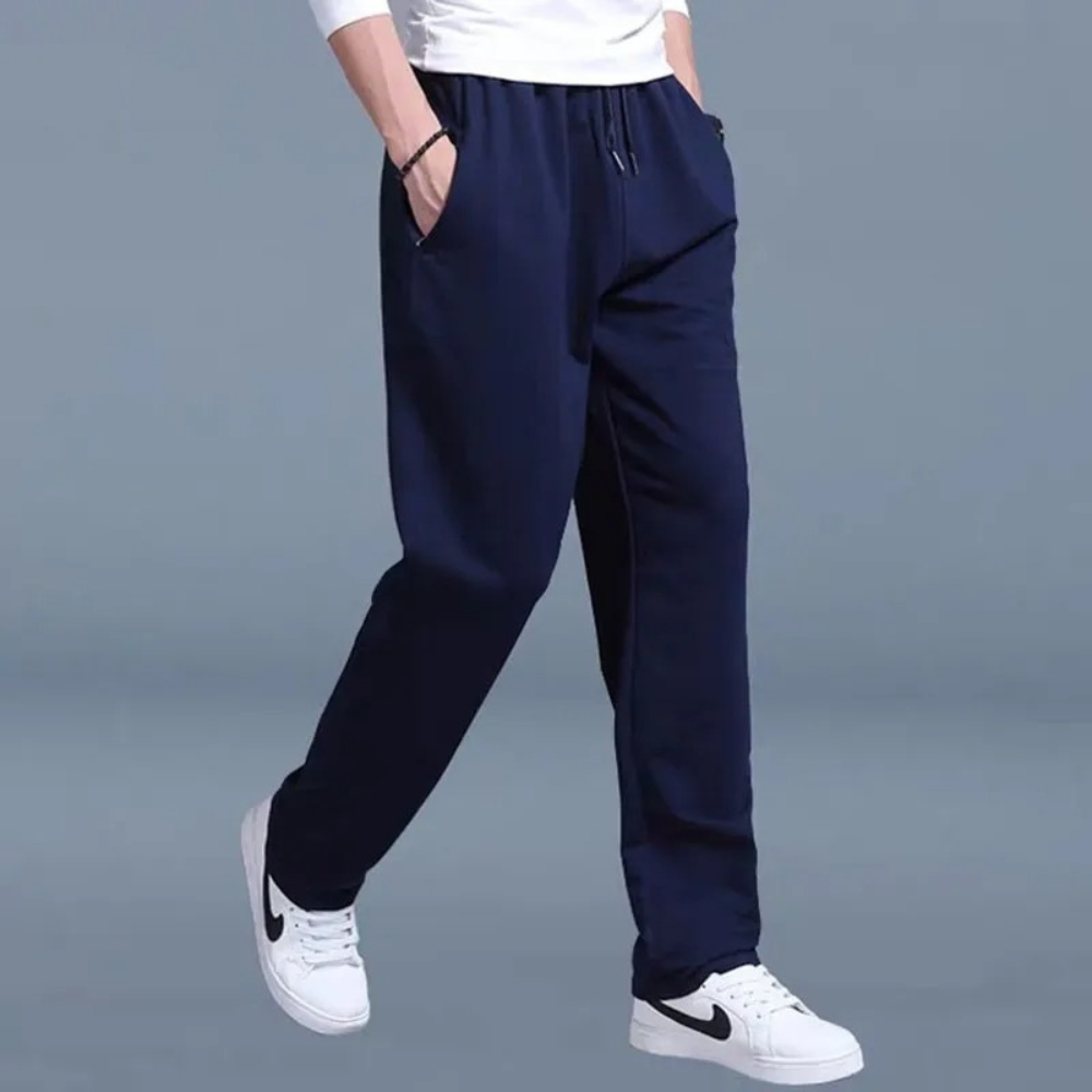 Pantalon de jogging décontracté homme, style moderne, parfait pour se détendre ou sortir.