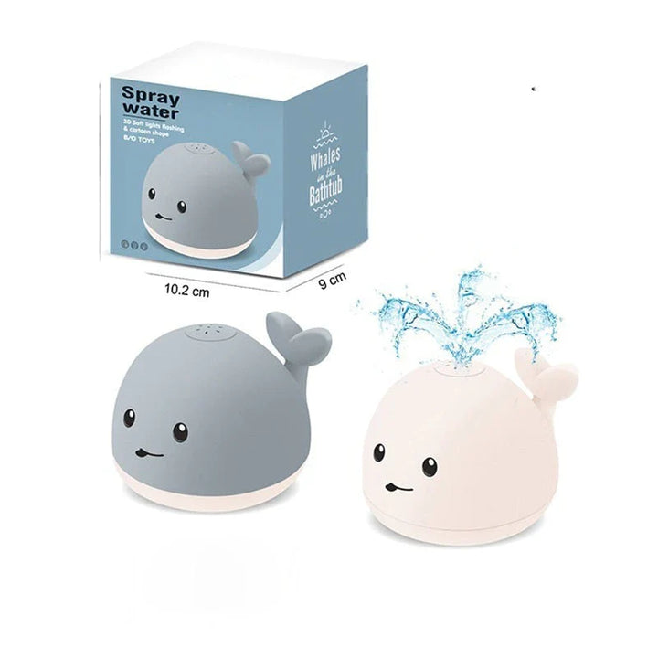 Jouet bain bébé: baleine avec jet d'eau LED.  Amusant et coloré.
