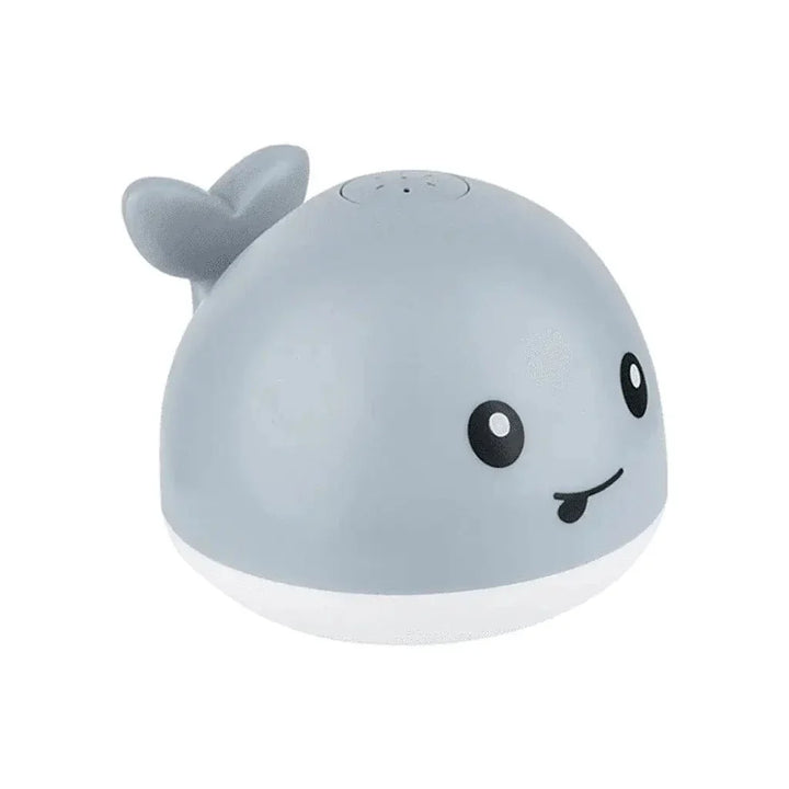 Jouet bain bébé: baleine avec jet d'eau LED.  Amusant et coloré.