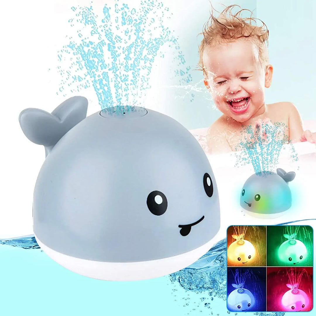 Jouet bain bébé: baleine avec jet d'eau LED.  Amusant et coloré.
