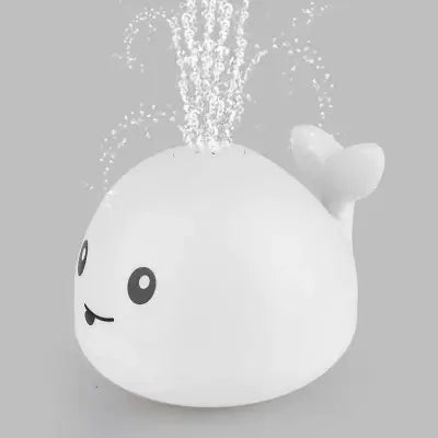 Jouet bain bébé: baleine avec jet d'eau LED.  Amusant et coloré.