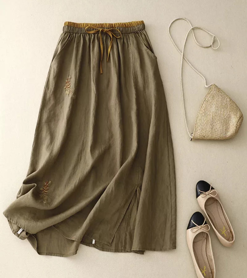 Jupe femme taille haute A-line avec poches. Style élégant et décontracté, parfaite pour l'été.
