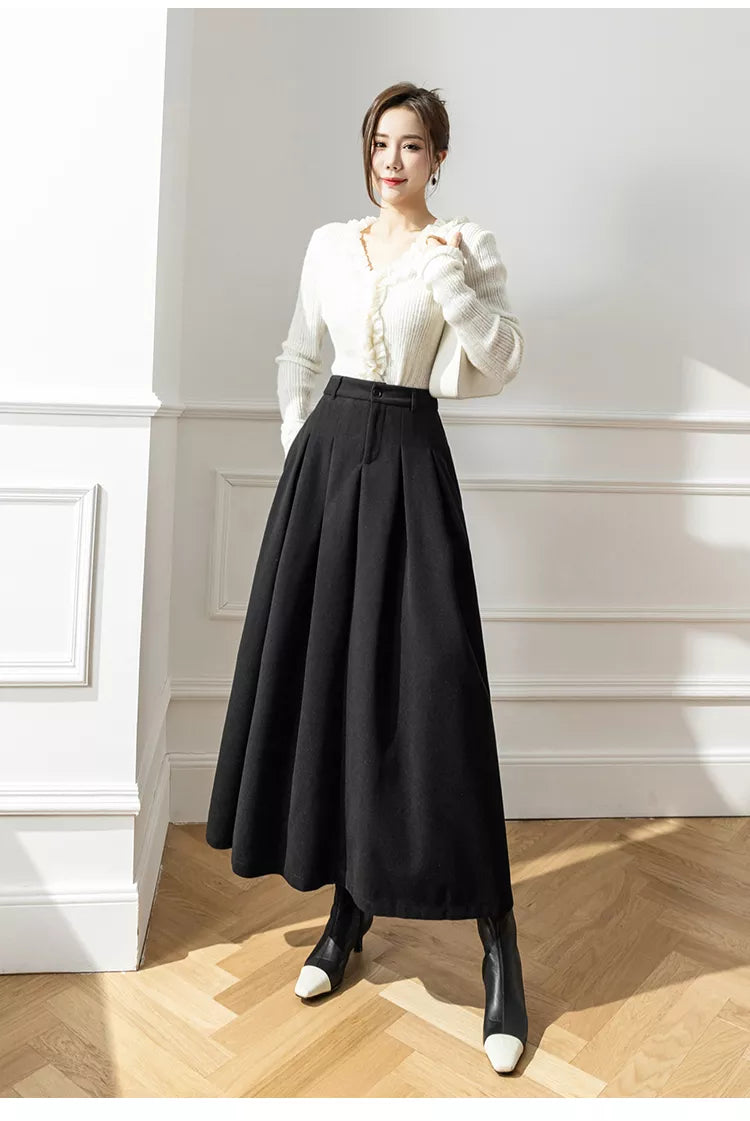 Jupe élégante pour femme, texture riche. Ajoute une touche chic au style intemporel et sophistiqué.