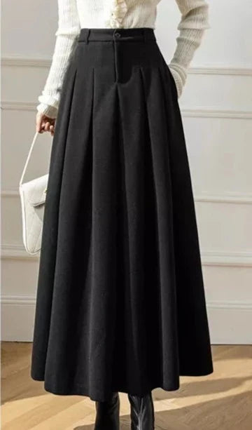 Jupe marron chic femme, style intemporel. Idéale pour un look élégant et décontracté ou formel.