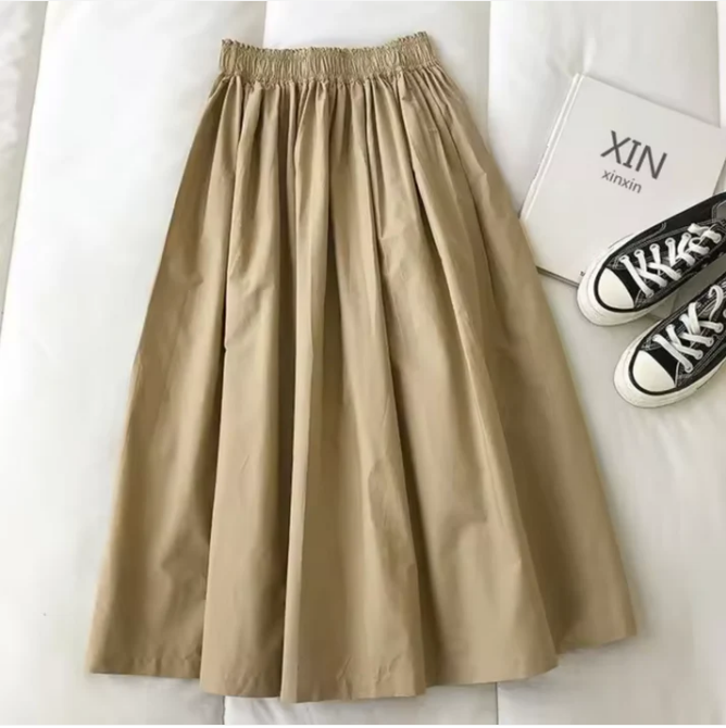 Jupe femme taille haute large et fluide, élégante et confortable. Idéale pour un style décontracté chic printanier.