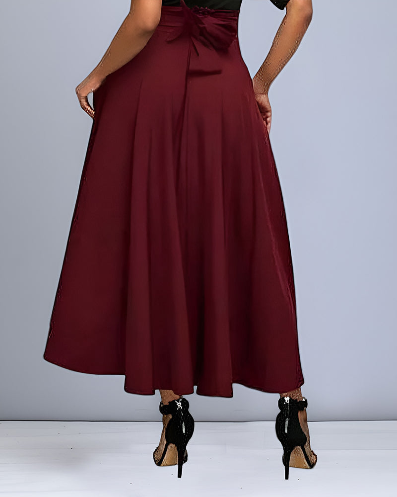 Jupe longue fluide femme, style automne décontracté chic. Vêtement mode femme élégant et confortable.