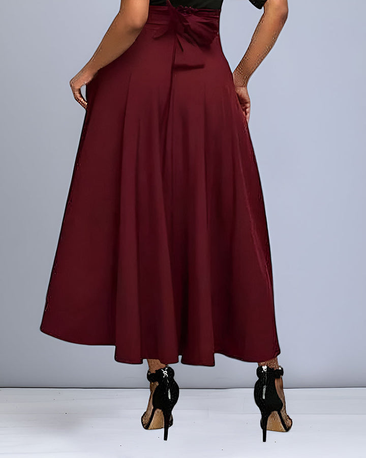 Jupe longue fluide femme, style automne décontracté chic. Vêtement mode femme élégant et confortable.