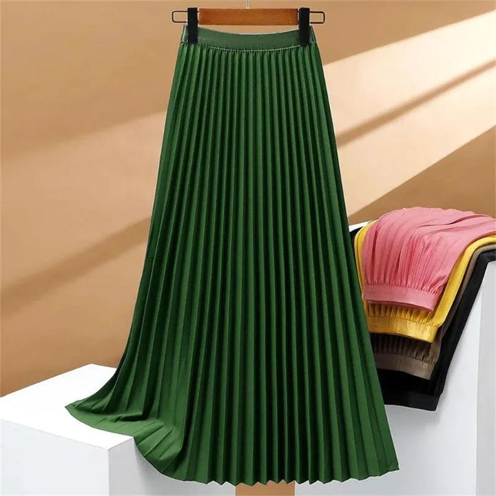 Jupe longue plissée taille haute pour femme. Sophistiquée et extensible, elle sublime votre silhouette avec style.
