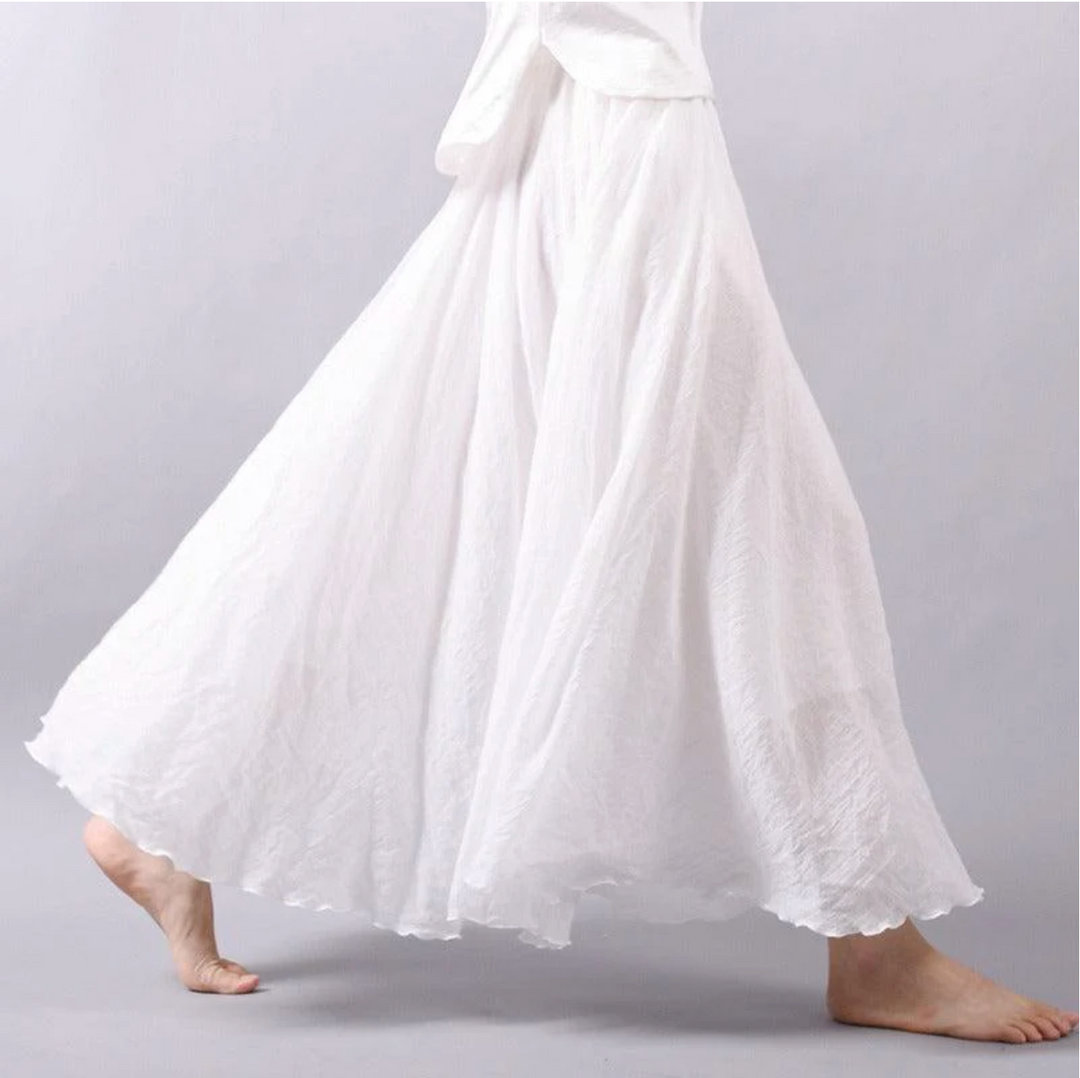Jupe femme Vera, longue et plissée, idéale pour une tenue élégante au quotidien.