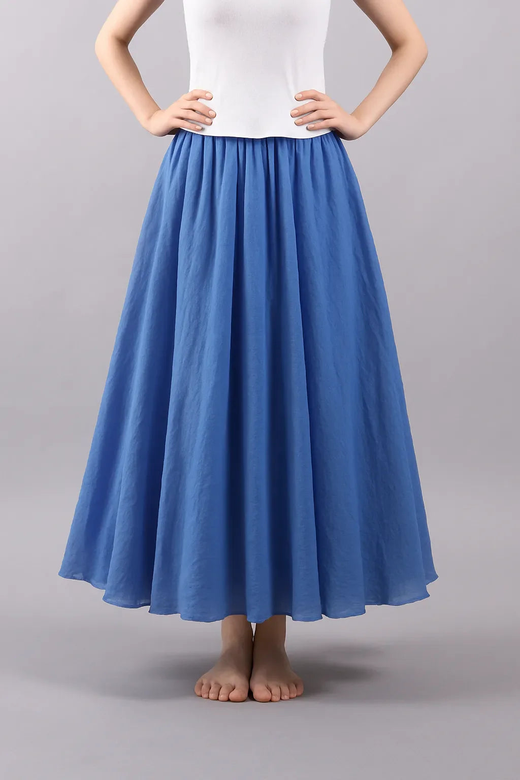 Modèle Vera : jupe longue plissée femme, élégance décontractée, parfaite pour toutes occasions.