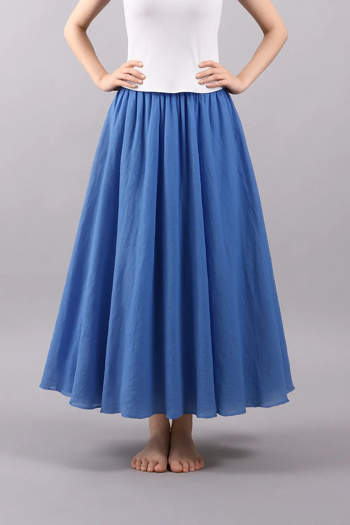 Modèle Vera : jupe longue plissée femme, élégance décontractée, parfaite pour toutes occasions.