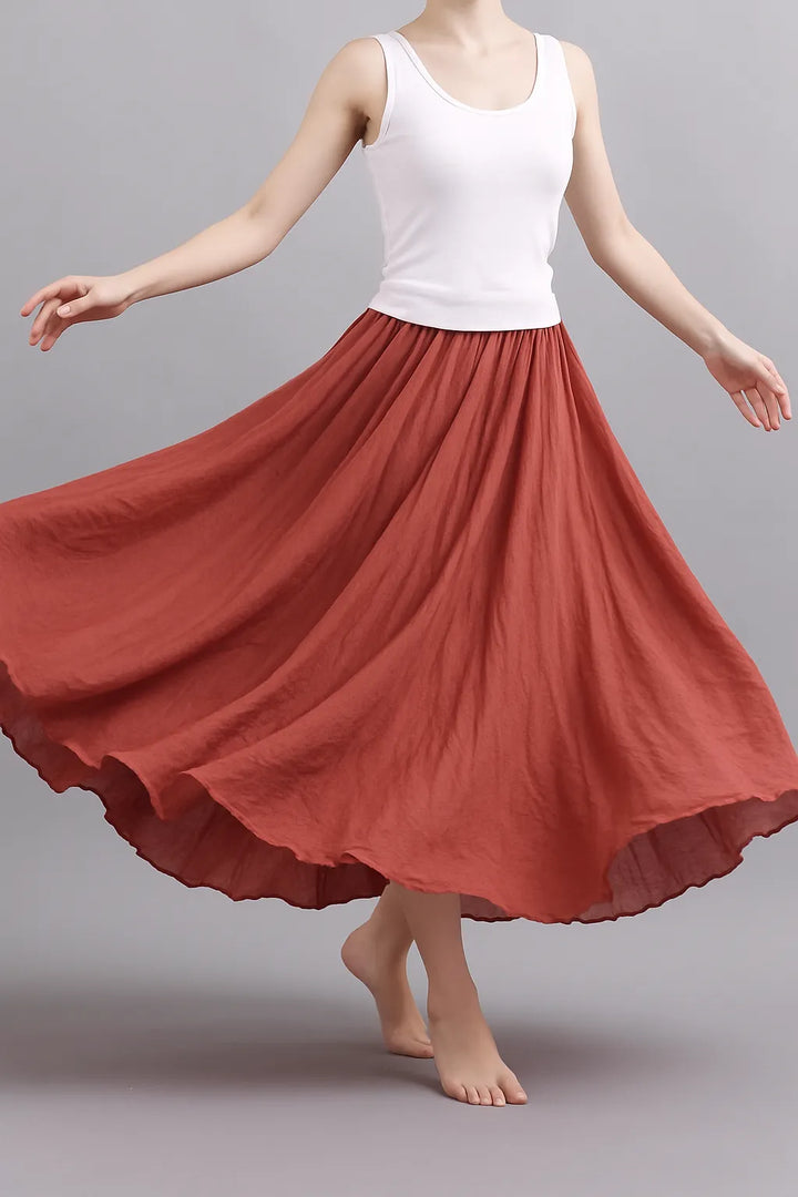 Jupe Vera pour femme, longue et plissée, apportant fluidité et élégance à votre look.