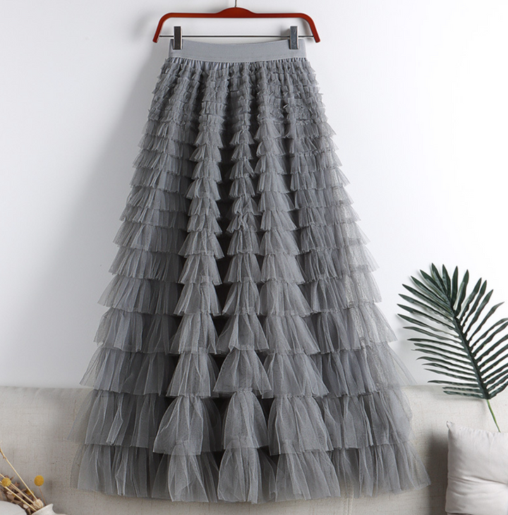 Élégante jupe longue vaporeuse, offre une liberté de mouvement et un confort optimal pour un style décontracté chic.