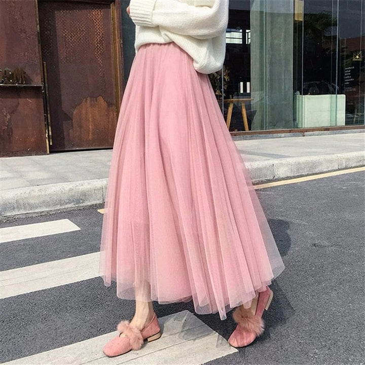 Jupe longue romantique pour femme, style évasé printemps-été. Parfaite pour un look décontracté et élégant.