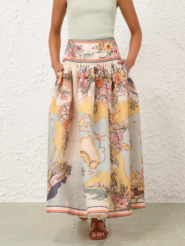 "Jupe midi Cindy élégante avec motifs floraux délicats pastel, charmante et féminine pour un look estival poétique."