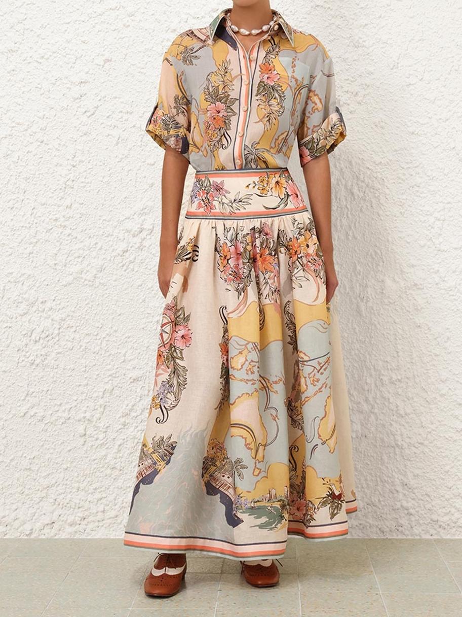 "Jupe midi Cindy élégante avec motifs floraux délicats pastel, charmante et féminine pour un look estival poétique."