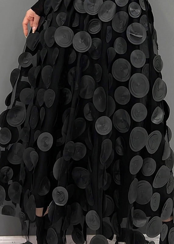 Jupe femme en tulle à pois, silhouette fluide et gracieuse, parfaite pour une soirée ou un événement chic.