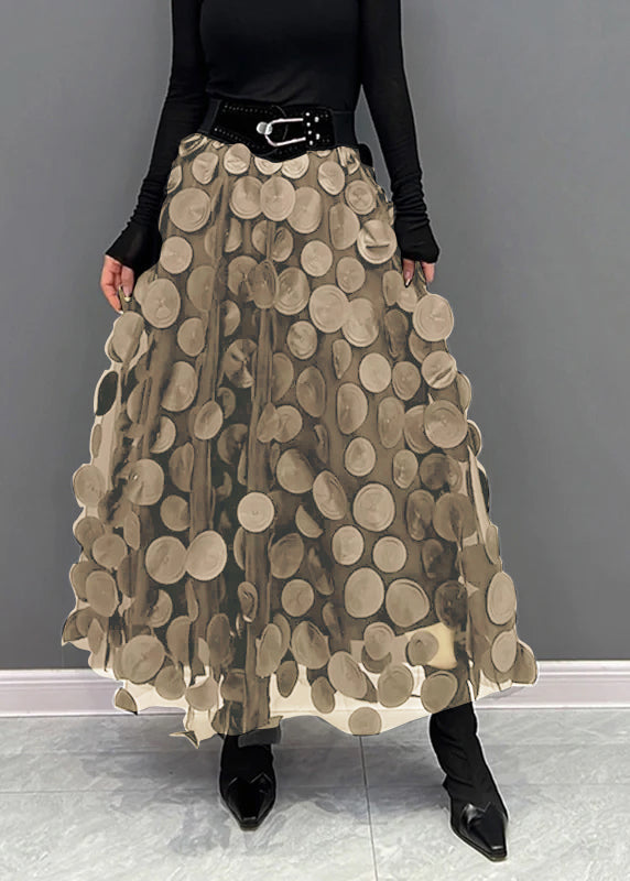 Jupe élégante en tulle à pois, design unique style patchwork, pour un look estival ou de printemps moderne.