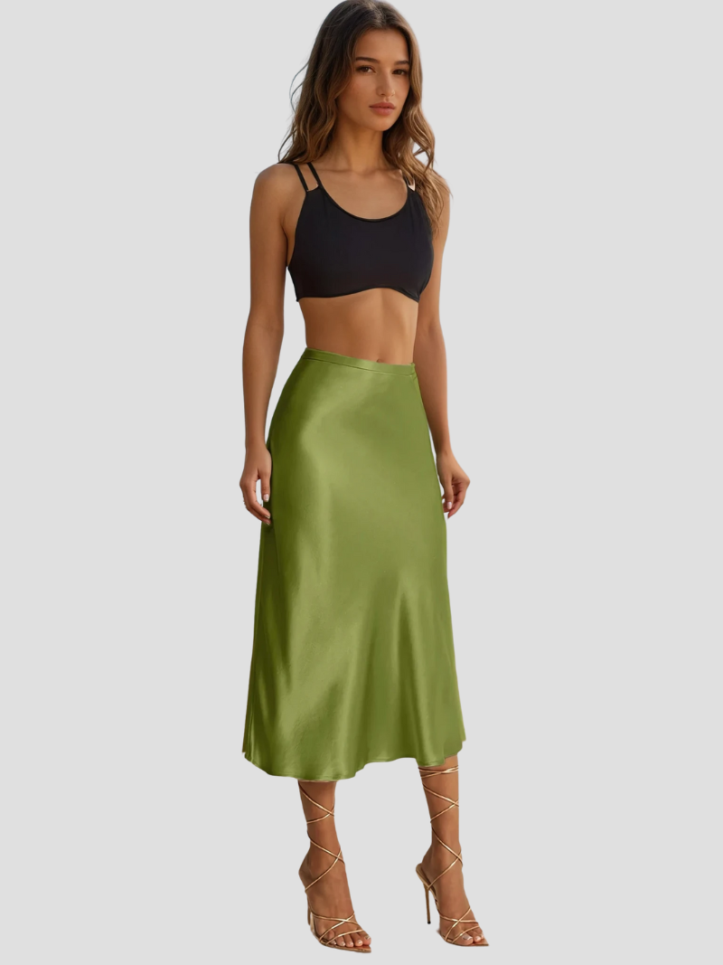 Jupe femme midi fluide et légère, taille haute. Vêtement féminin polyvalent pour toutes les occasions élégantes.