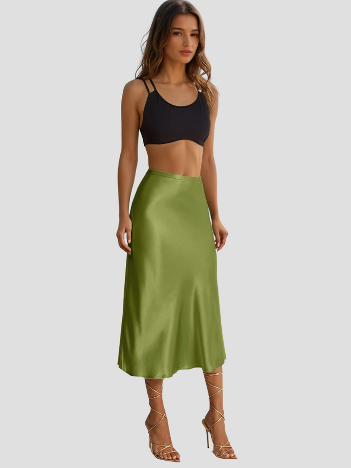 Jupe femme midi fluide et légère, taille haute. Vêtement féminin polyvalent pour toutes les occasions élégantes.