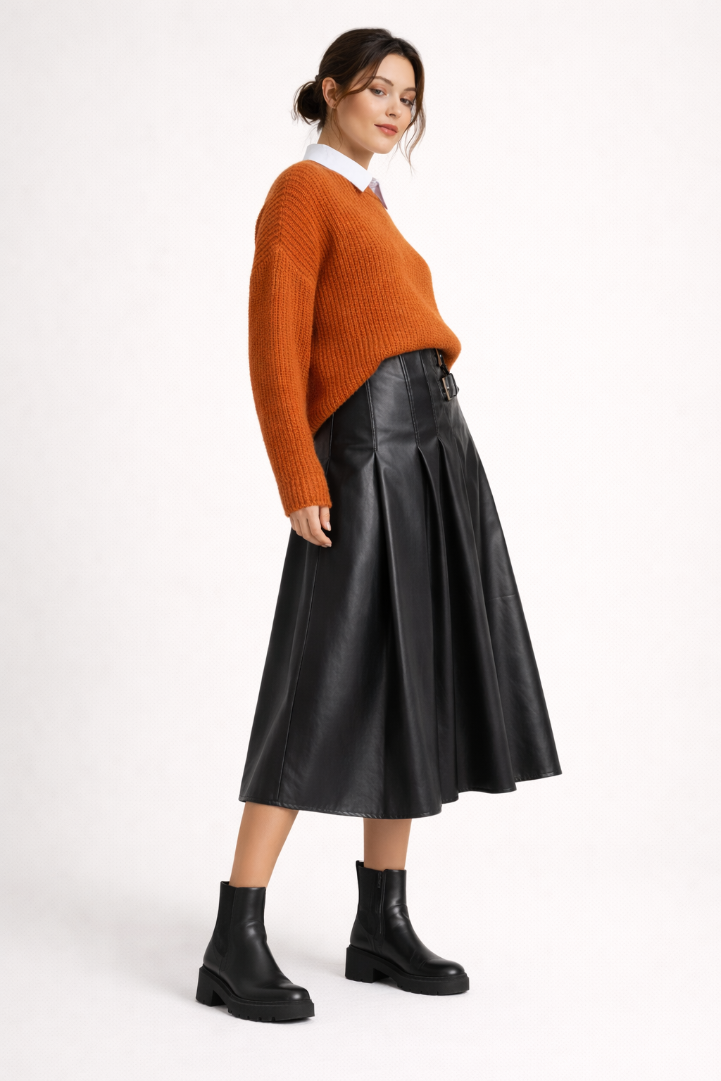 Style Valeria: Jupe midi femme sophistiquée effet cuir. Élégance intemporelle pour un look chic.