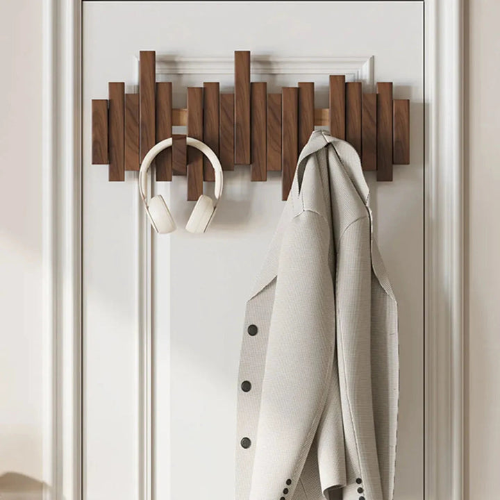 Kapstok piano en bois élégant pour vestes et manteaux. Design intemporel, accrochage mural facile.