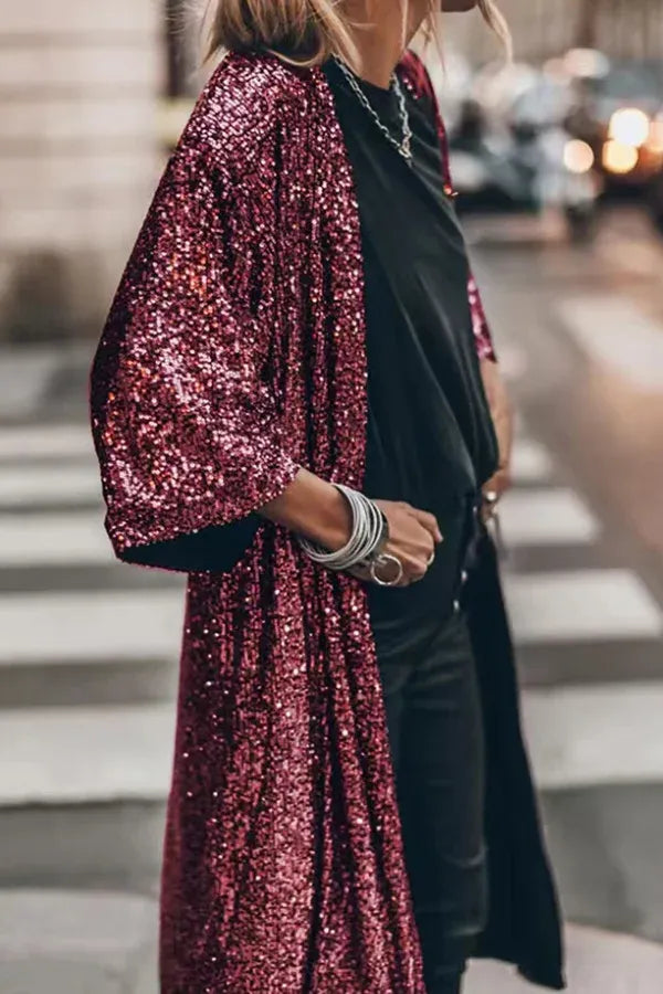 Surchemise festive femme à paillettes, coupe kimono, pour un style étincelant et moderne.
