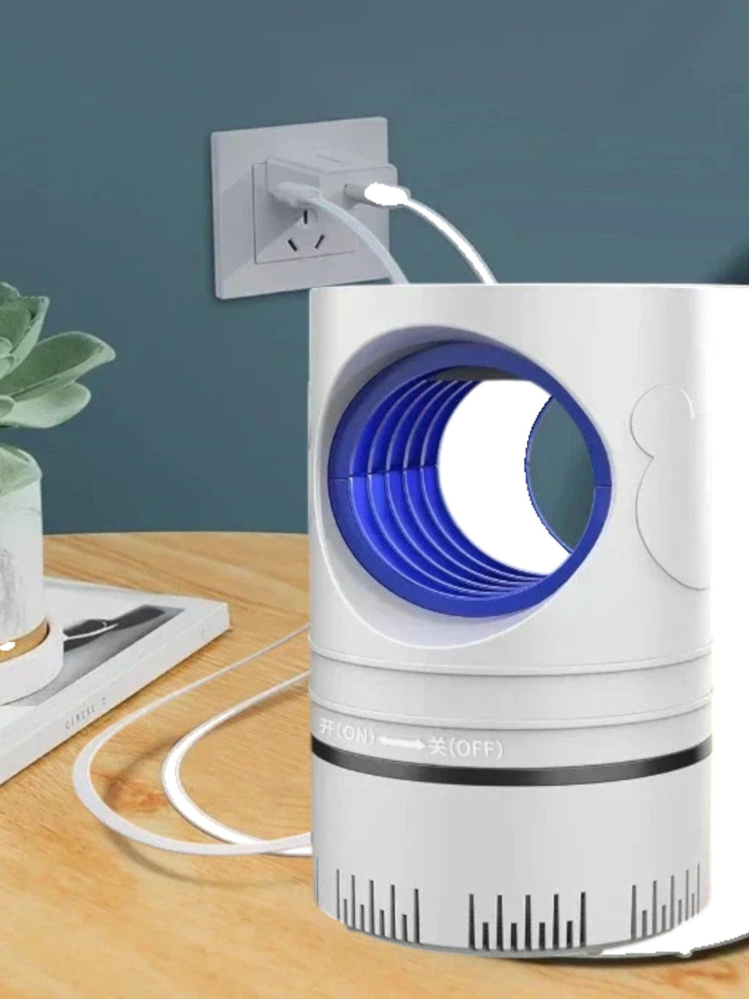 Lampe anti-moustiques silencieuse.  Attrape et élimine les insectes efficacement. Design élégant.
