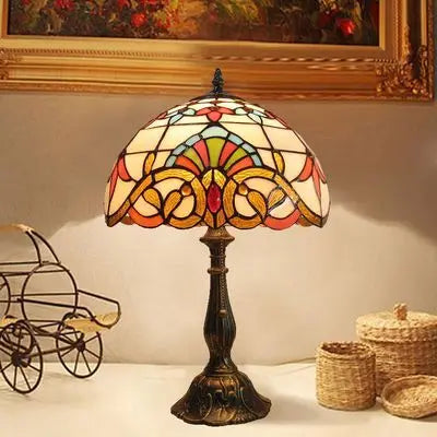 Lampe de bureau style Tiffany, verre coloré, col ajustable.  Design élégant, lumière chaleureuse.