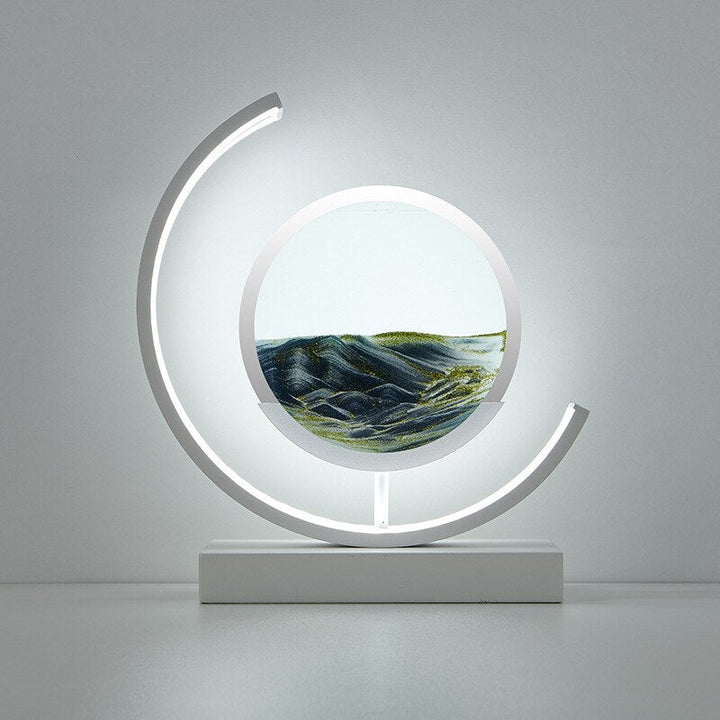 "Lampe de table élégante avec design sable mouvant coloré et dynamique, ambiance apaisante pour intérieur moderne."
