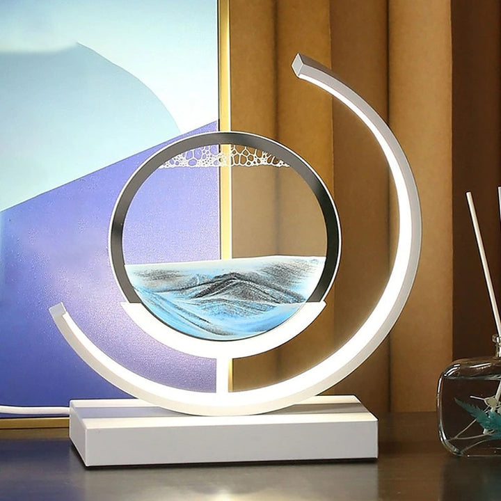 "Lampe de table élégante avec design sable mouvant coloré et dynamique, ambiance apaisante pour intérieur moderne."