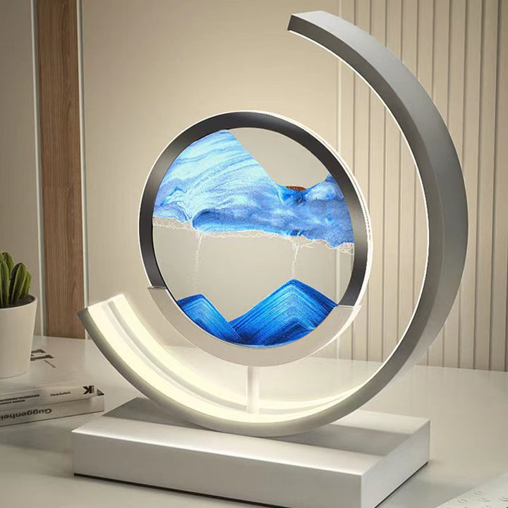 "Lampe de table élégante avec design sable mouvant coloré et dynamique, ambiance apaisante pour intérieur moderne."