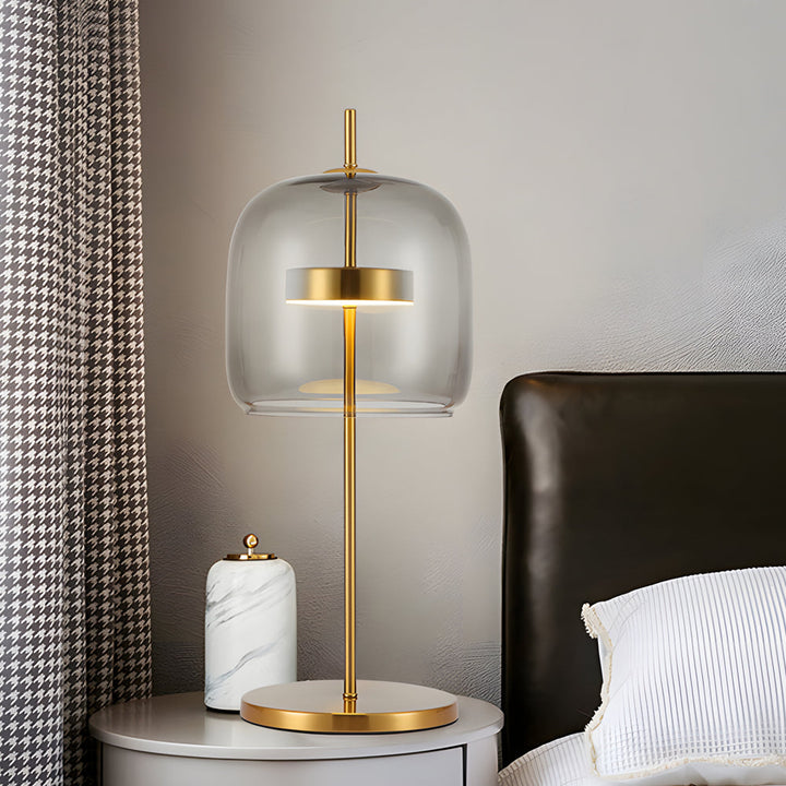 "Lampe de table en verre fumé LumiLux, design élégant, ambiance chaleureuse pour salon, chambre ou bureau."