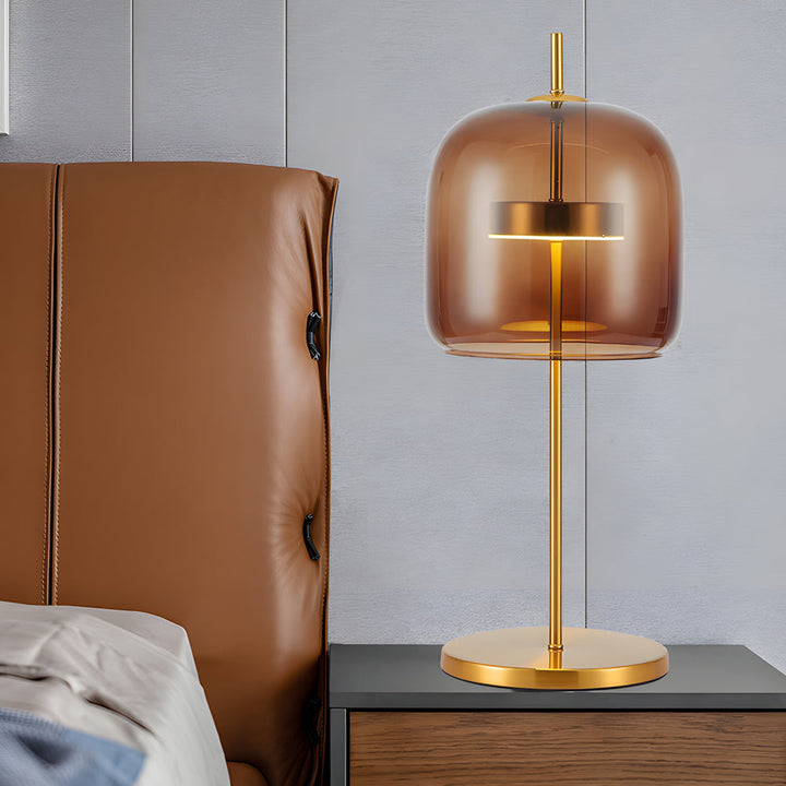 "Lampe de table en verre fumé LumiLux, design élégant, ambiance chaleureuse pour salon, chambre ou bureau."