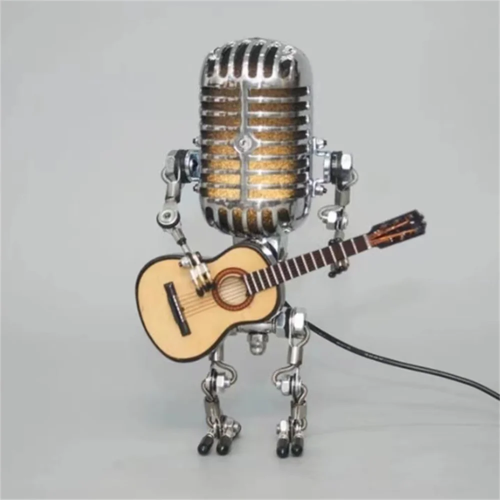 Lampe de table robot en métal avec guitare, design moderne, éclairage variable, idéale pour la décoration intérieure unique.