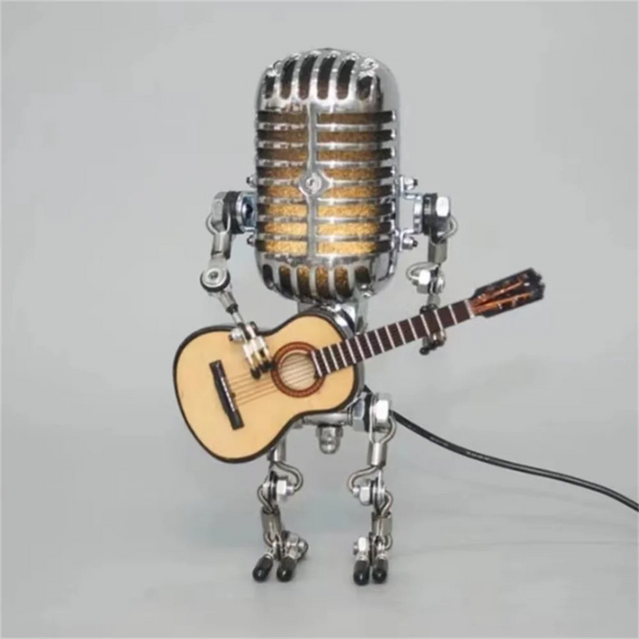 Lampe de table robot en métal avec guitare, design moderne, éclairage variable, idéale pour la décoration intérieure unique.