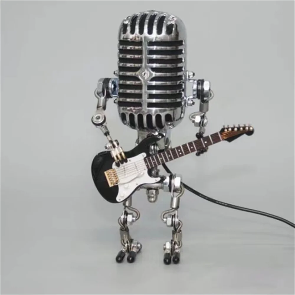 Lampe de table robot en métal avec guitare, design moderne, éclairage variable, idéale pour la décoration intérieure unique.