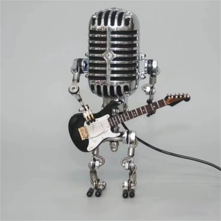 Lampe de table robot en métal avec guitare, design moderne, éclairage variable, idéale pour la décoration intérieure unique.