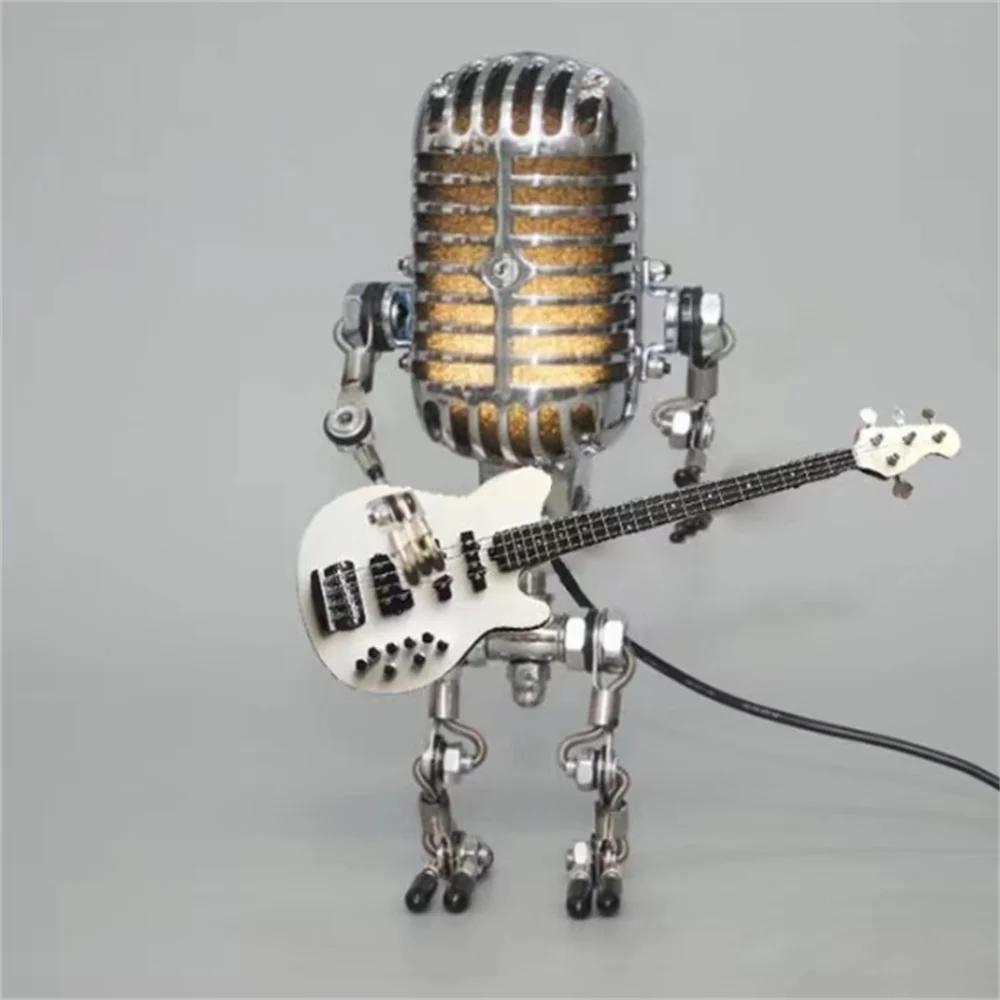 Lampe de table robot en métal avec guitare, design moderne, éclairage variable, idéale pour la décoration intérieure unique.