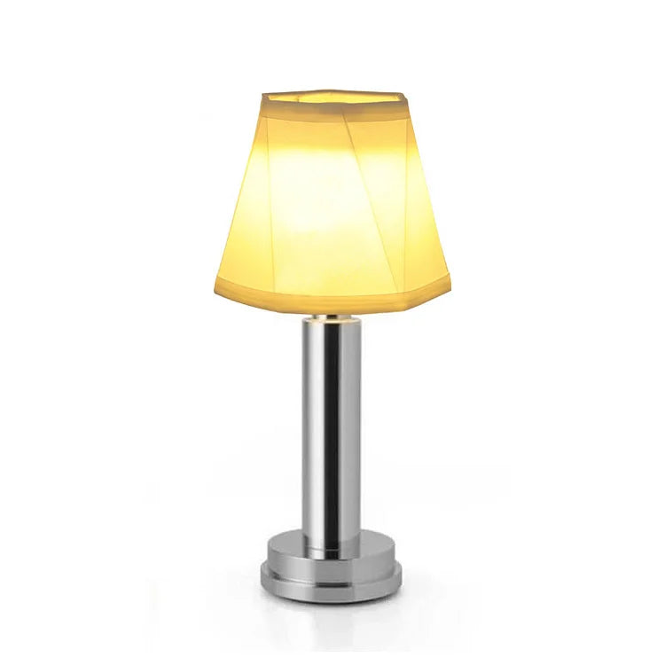 Lampe de table sans fil rechargeable. Design moderne et élégant. Lumière chaude et diffuse.