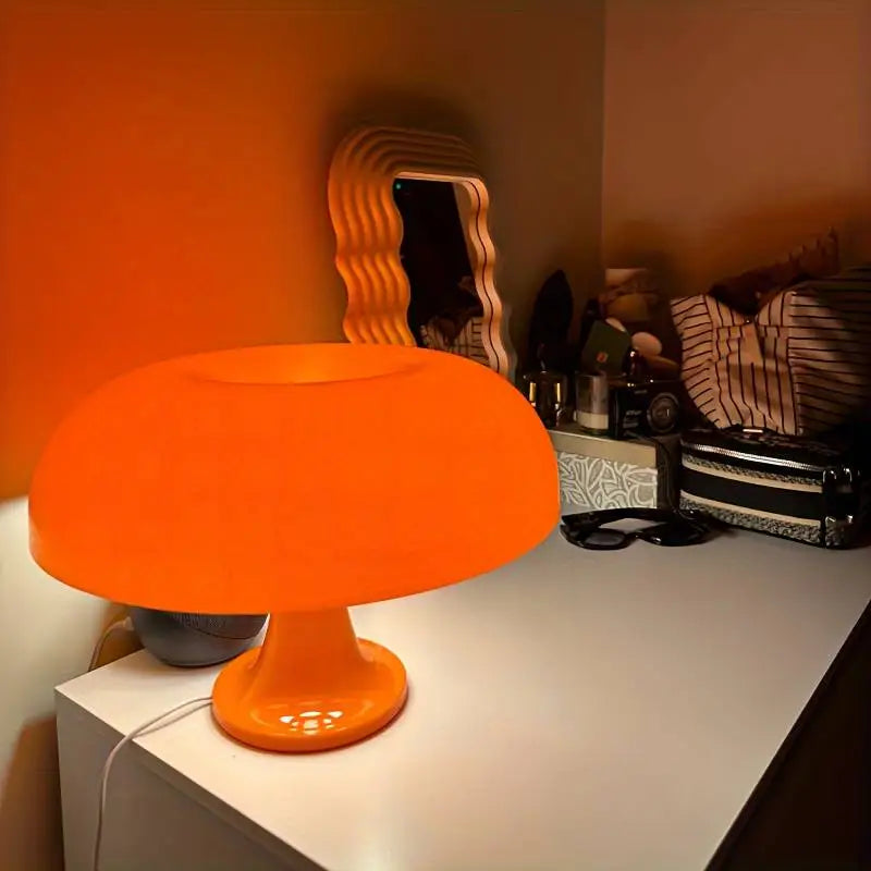 "Lampe de table vintage réglable en verre, design minimaliste, finition blanche et orange, pour ambiance intérieure élégante.