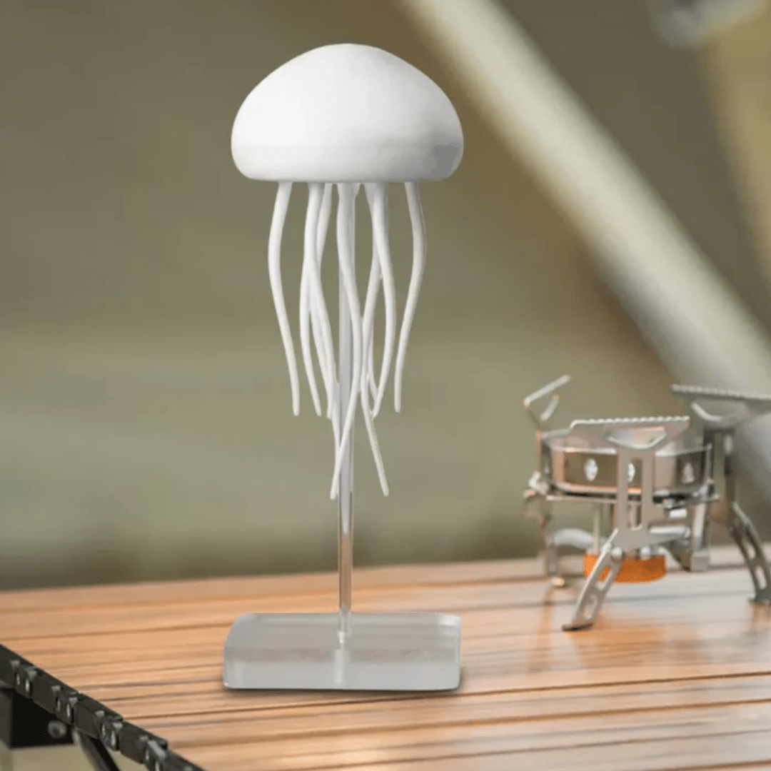 Lampe LED méduse décorative, ambiance relaxante.  Lumière douce, design compact et rechargeable. Idéale pour la maison.