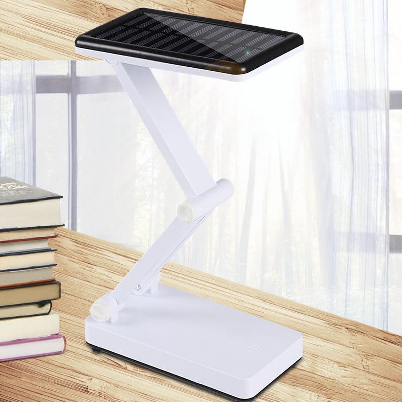 Lampe LED pliable solaire pour extérieur, design compact, ajustable, idéale camping, lecture, lumière d'urgence.