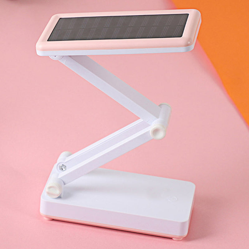 Lampe LED pliable solaire pour extérieur, design compact, ajustable, idéale camping, lecture, lumière d'urgence.