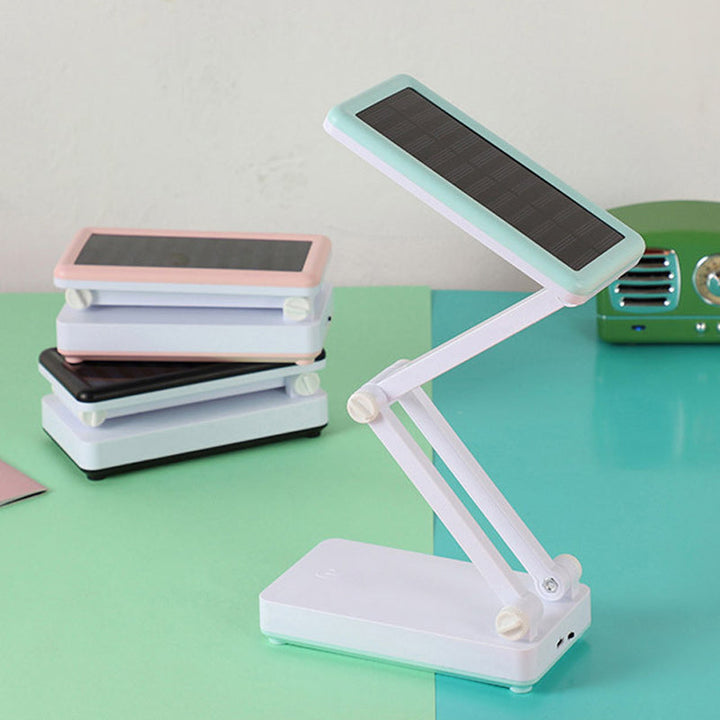 Lampe LED pliable solaire pour extérieur, design compact, ajustable, idéale camping, lecture, lumière d'urgence.