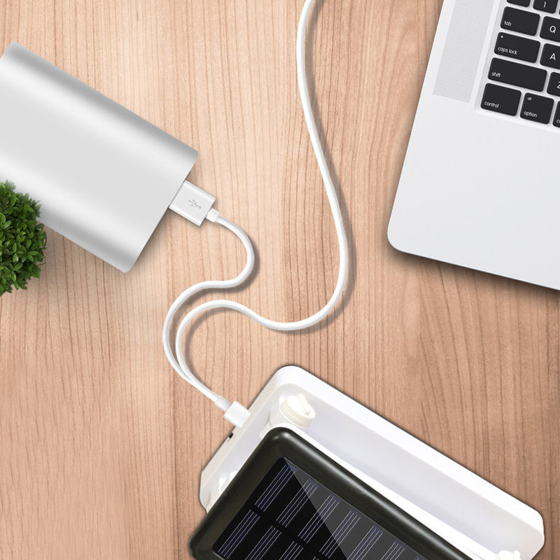 Lampe LED pliable solaire pour extérieur, design compact, ajustable, idéale camping, lecture, lumière d'urgence.