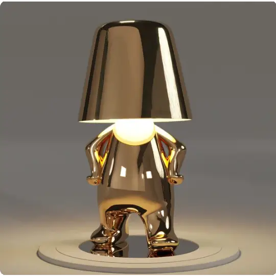 Lampe LED tactile or moderne, sans fil et rechargeable, design formes humaines, ambiance chaleureuse et décorative.