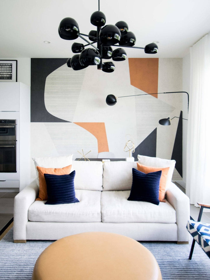 "Lampe murale moderne avec bras orientable, design organique années 50, finition métal noir, idéale pour intérieur épuré."